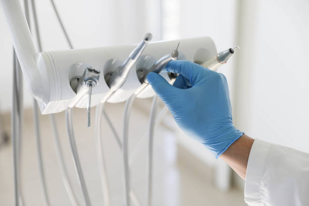 Professional Tooth Extraction technician working in Malone, FL